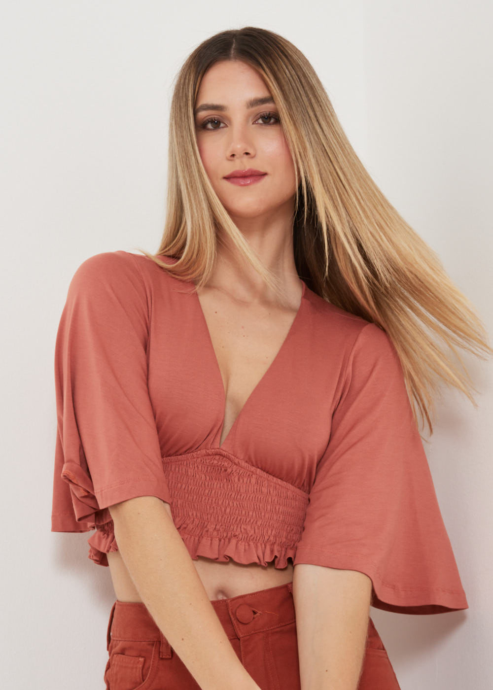 67.40.3105TAM BLUSA MALHA DECOTE V COM LASTEX