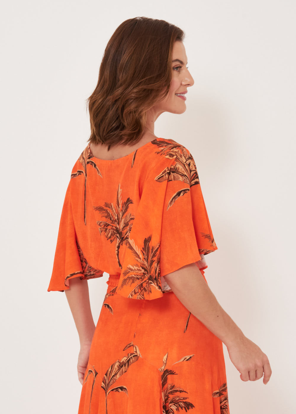 57.20.3204EST BLUSA MANGA SINO ESTAMPA COQUEIRO TROPICAL