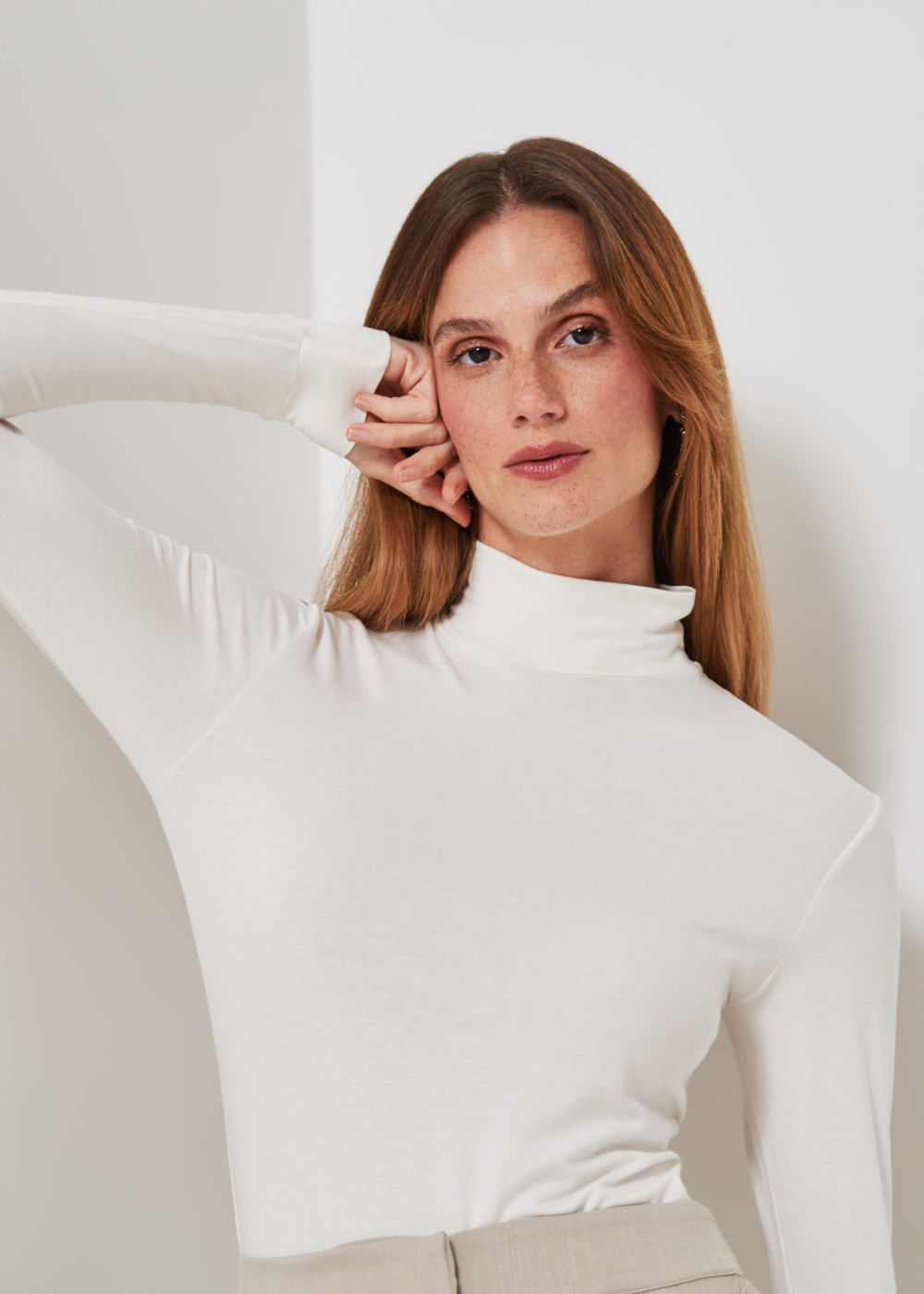 66.10.3302OFW BLUSA MALHA M/LGOLA ALTA BÁSICA