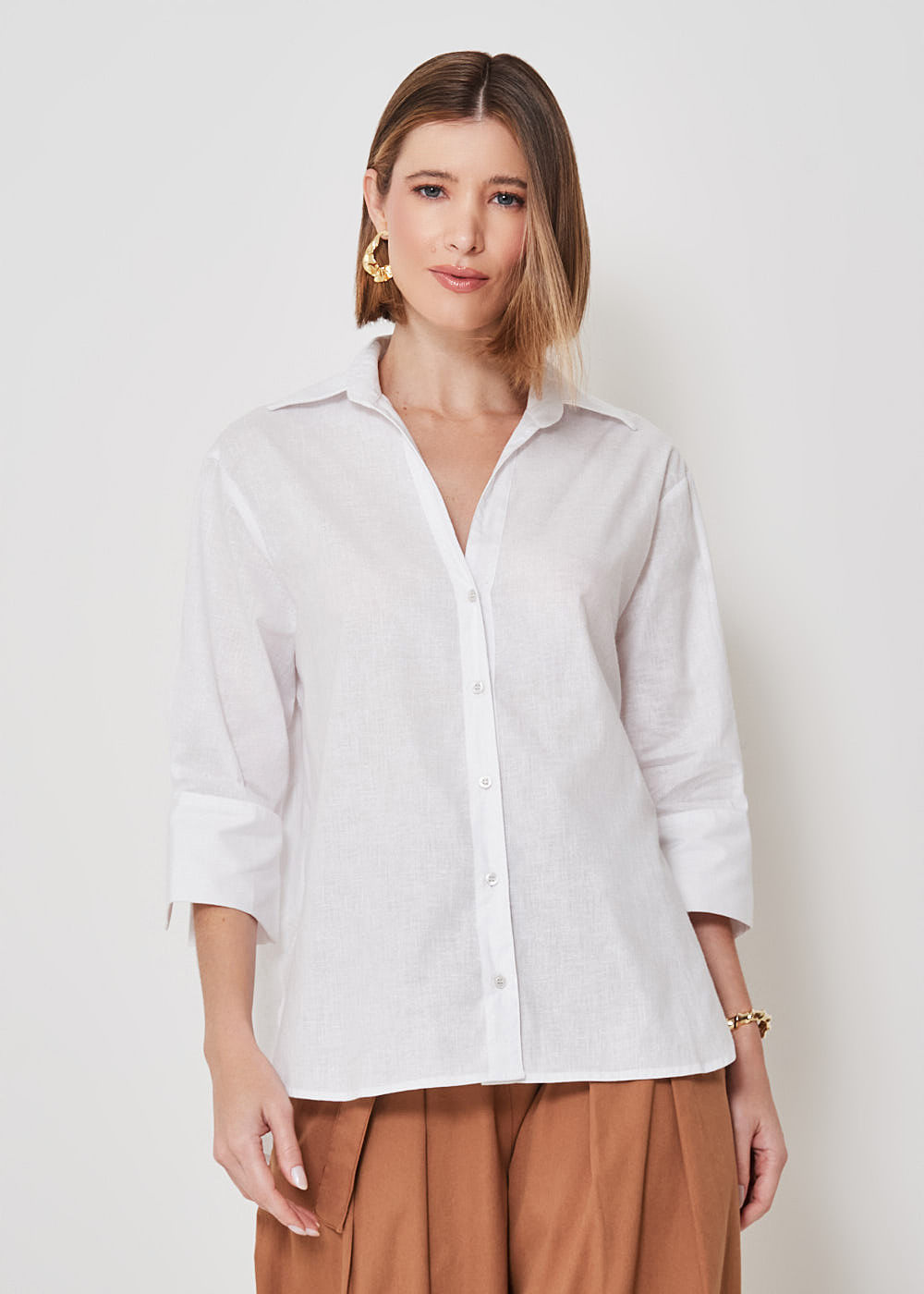55.40.3409BCO CAMISA M/L ABOTOAMENTO FRENTE