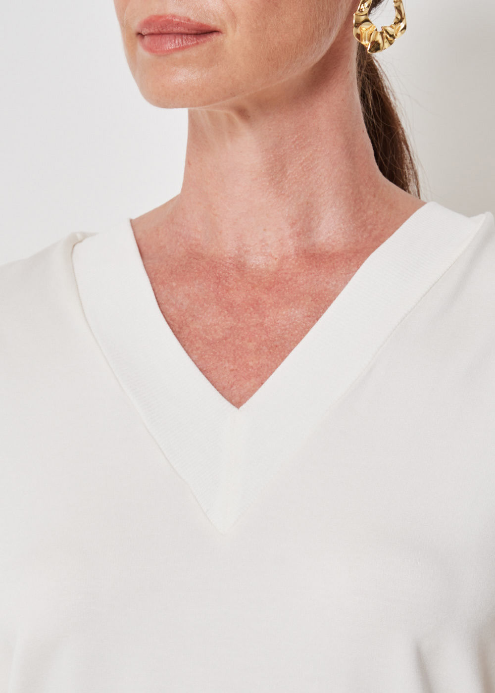 67.40.3402OFW BLUSA M/C GOLA V EM RIBANA