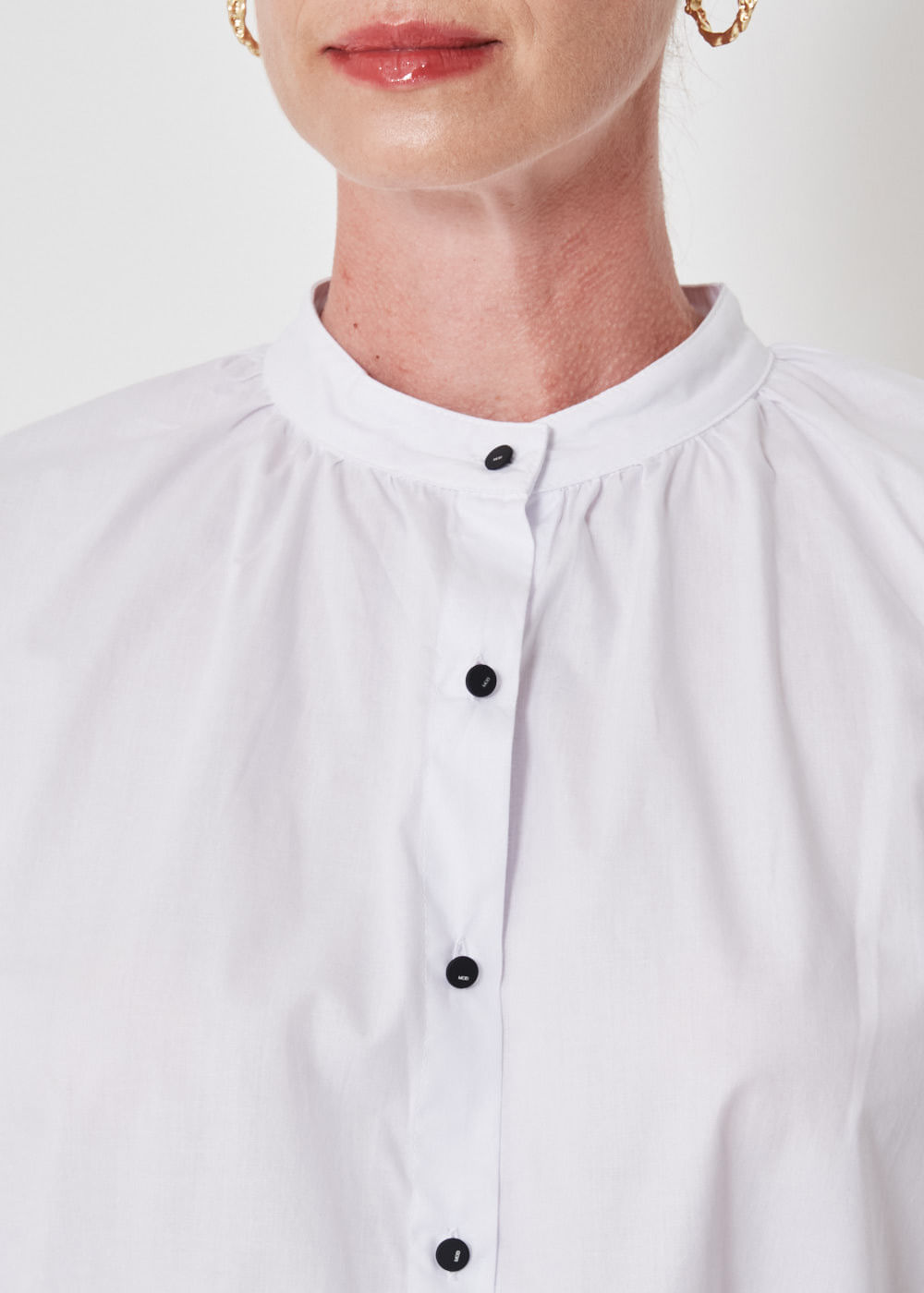 55.70.3401BCO CAMISA OVERSIZED GOLA PADRE