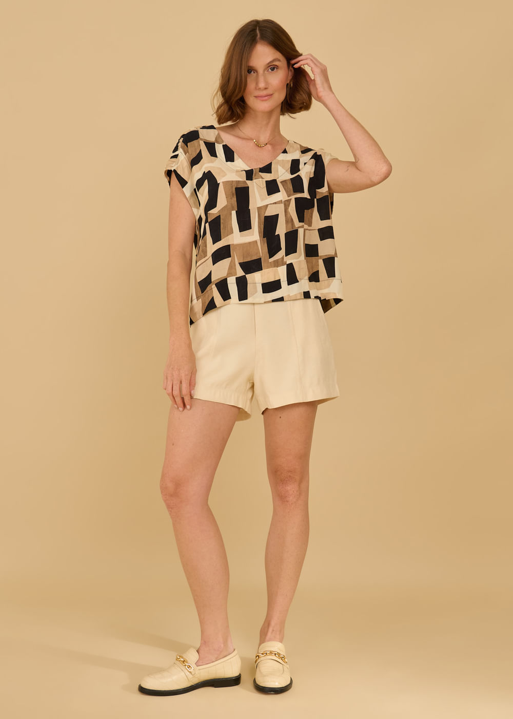 57.20.3609EST BLUSA M/C ESTAMPA EL CASTILLO