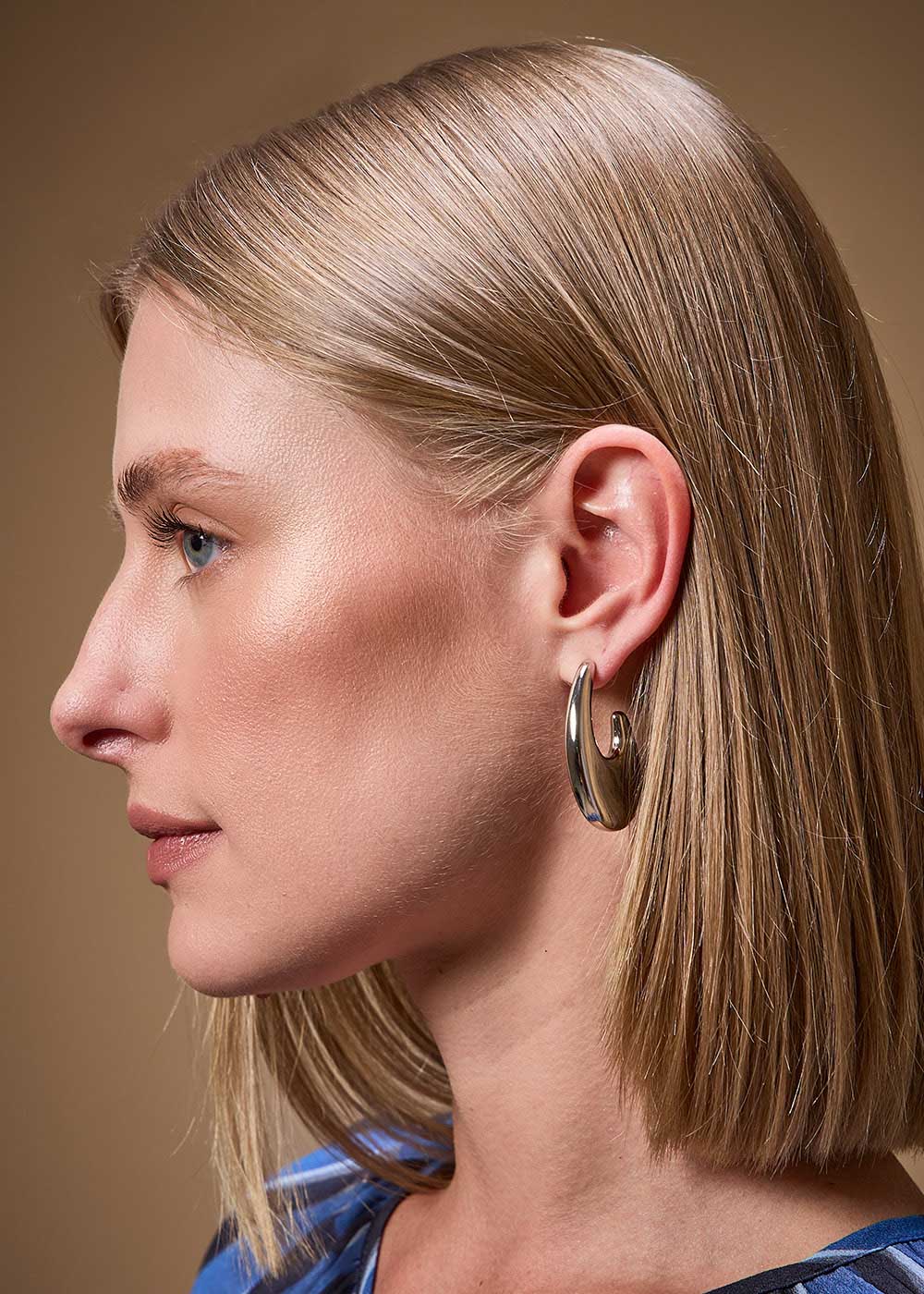 75.40.3709NIQ BRINCO GOTA ARQUEADA