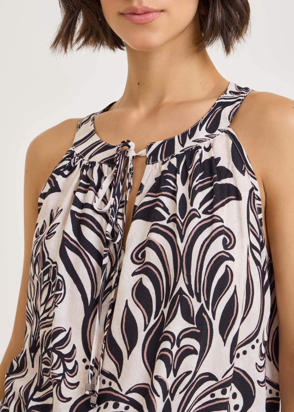 58.20.7701EST REGATA HALTER ESTAMPA LIGHT LEAVES